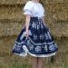 Suknica Biely folklór na tmavomodrej CD 69 so šnurovačkou
