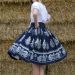 Suknica Biely folklór na tmavomodrej CD 69 so šnurovačkou