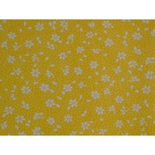 Biele kvietky s bodkou na žltej